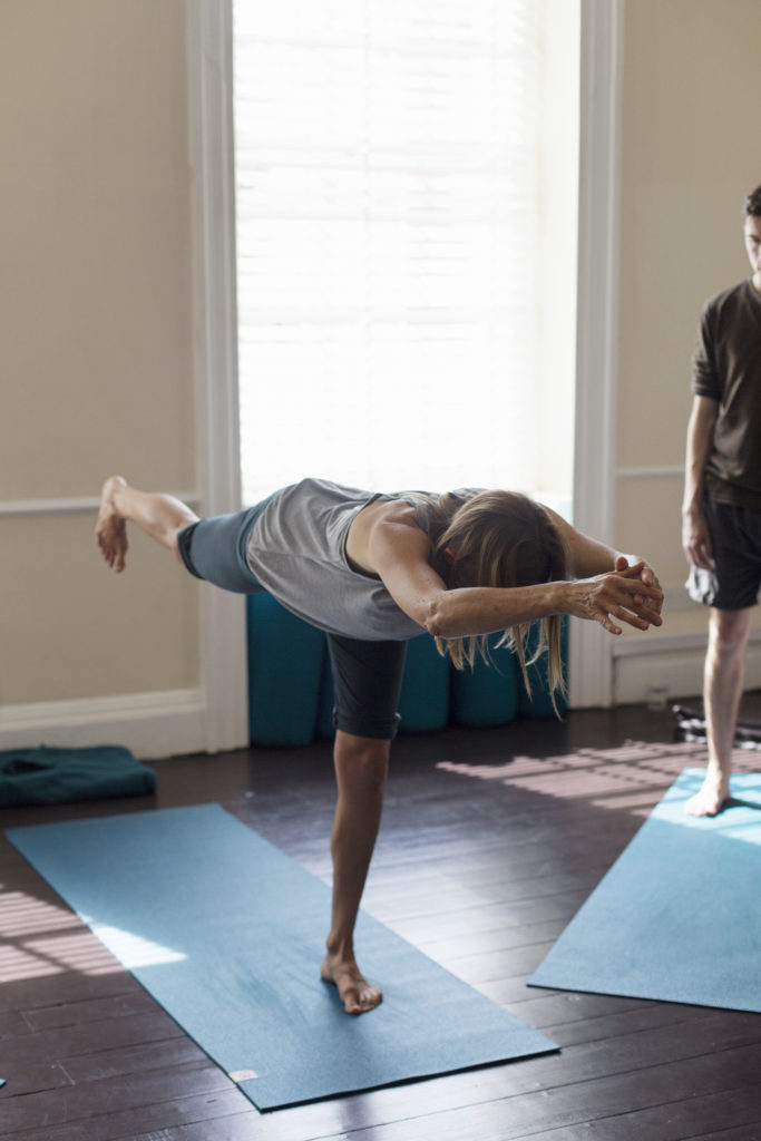 Caroline Reid, Bristol based Scaravelli-inspired teacher, in Virabhradrasana 3